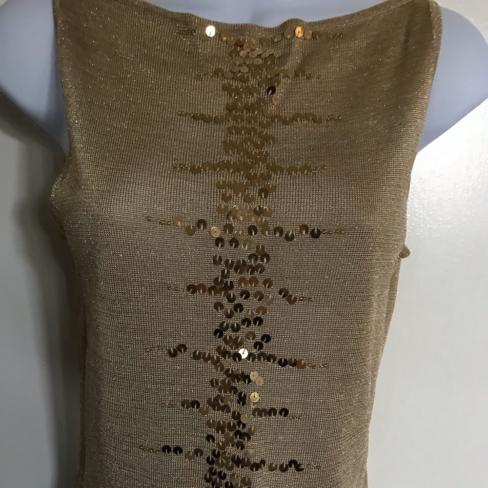 Takeout , gold metallic size L runs M , top